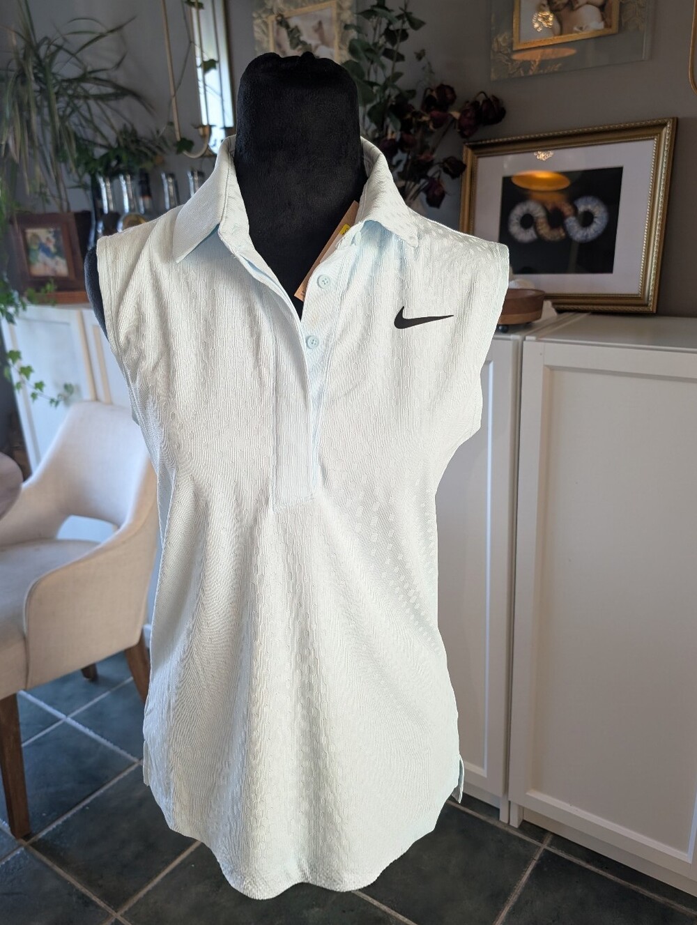 Women's Nike Light Blue Sleeveless Polo Tank Top with Black Swoosh